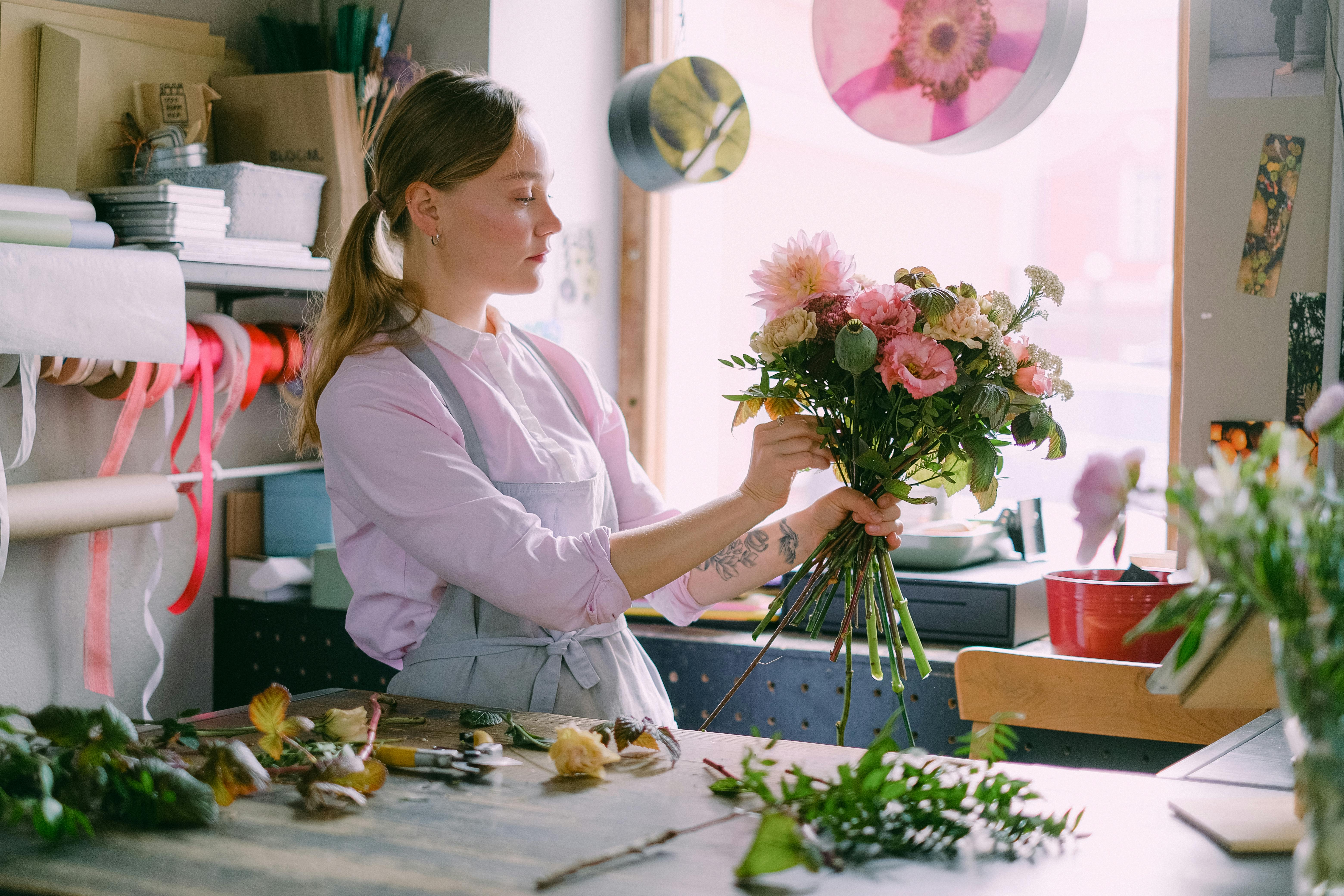 Florist designing a bouquet